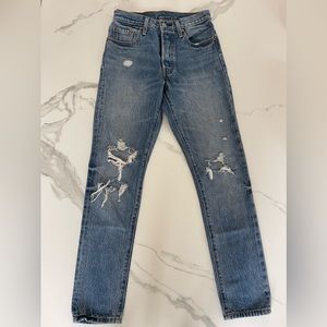Levi’s 501 High Waisted jeans distresses at the knees